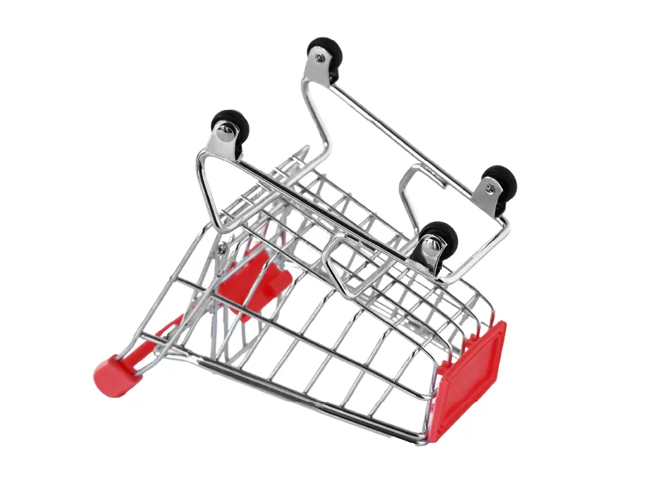 A shoppig cart upside down.